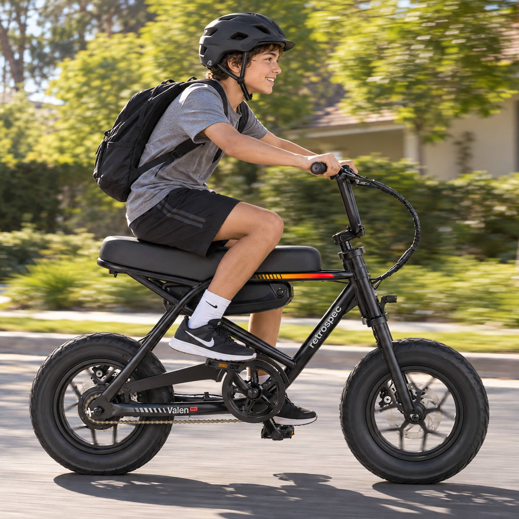Retrospec Valen Rev 14 electric bike — rider lifestyle photo